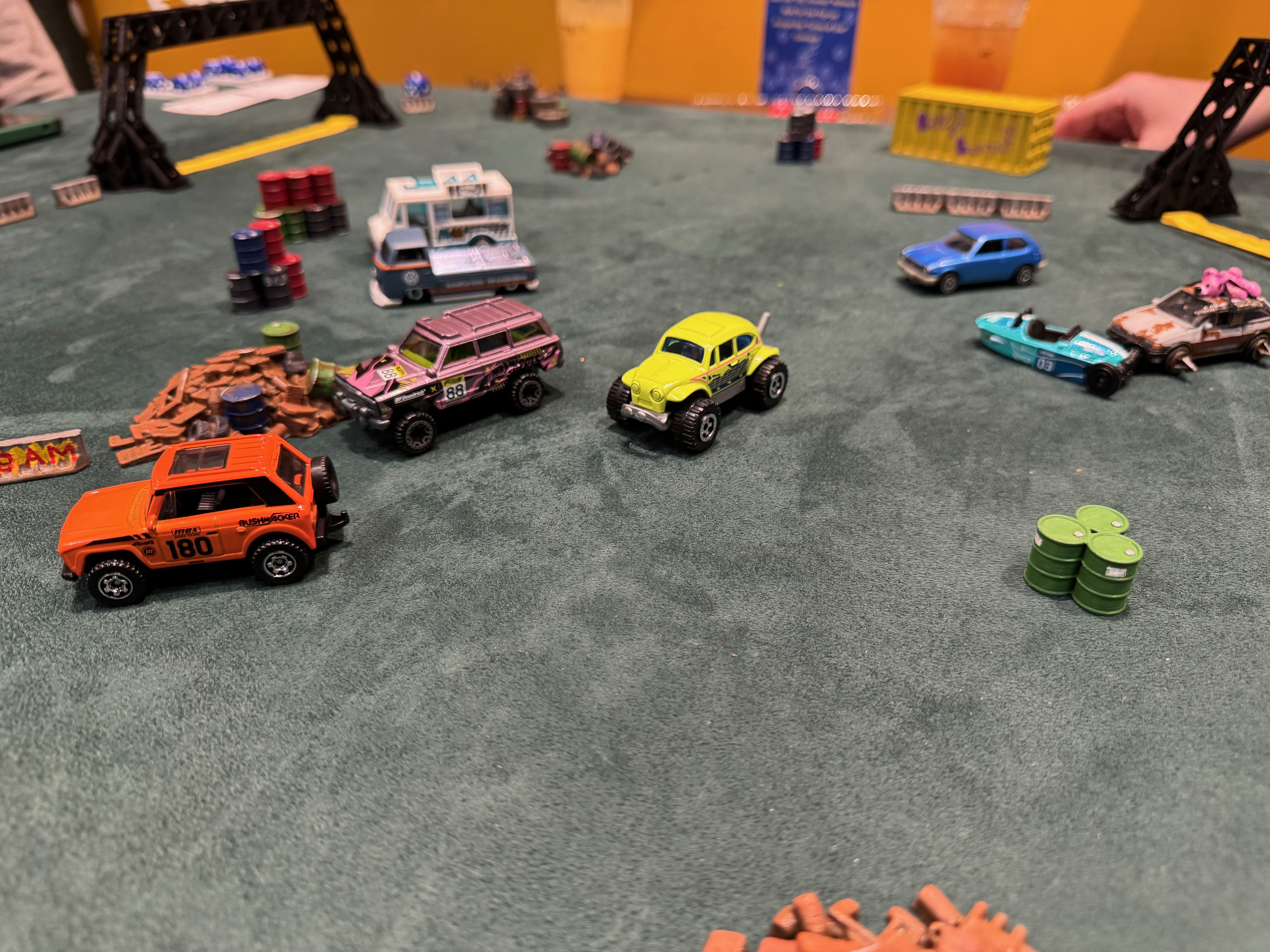 A Gaslands vehicle armed with scratch-built weapons takes aim at an opponent.