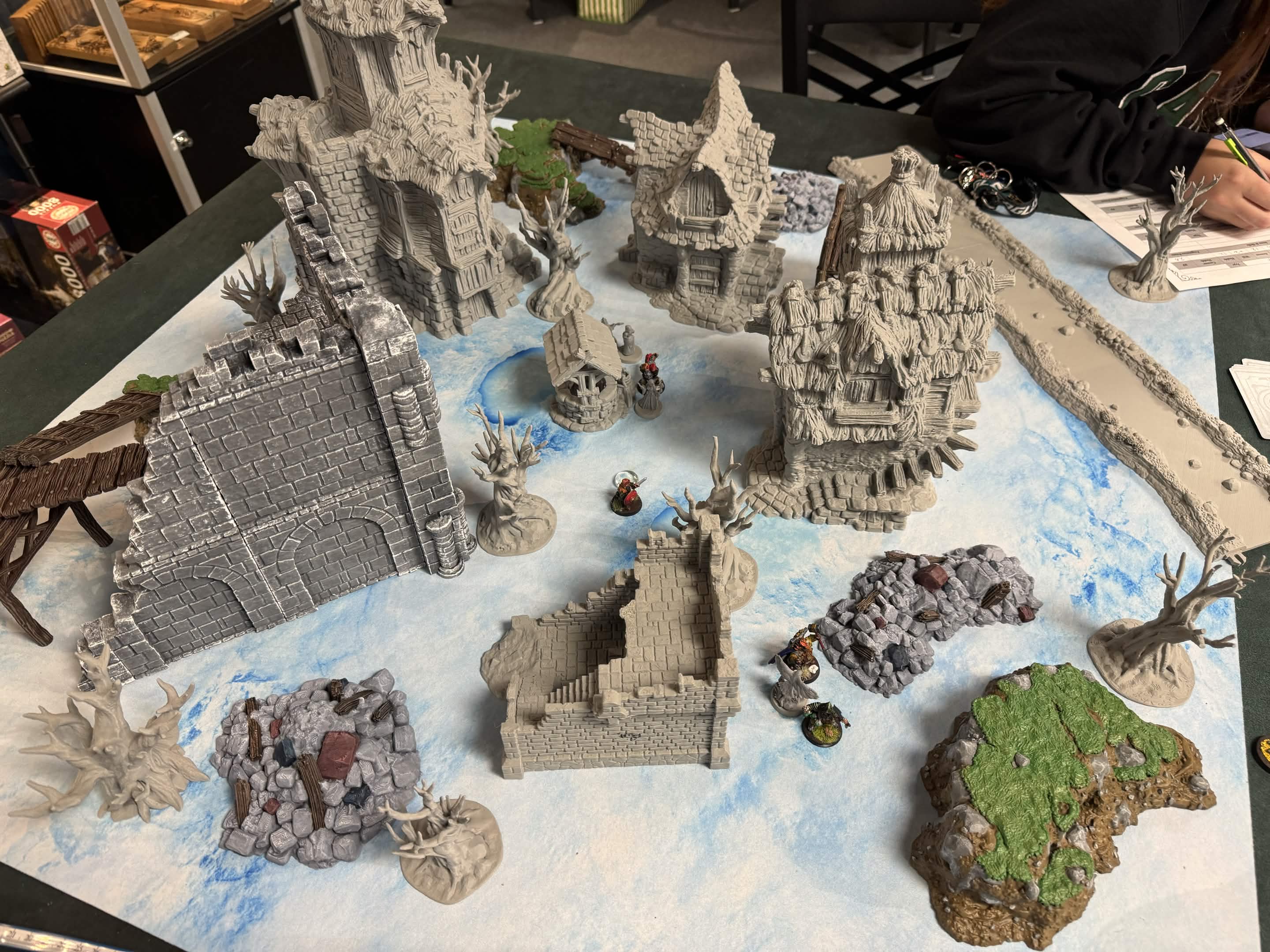 The rangers explore a dense village.